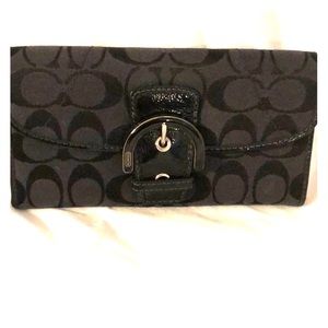 Coach signature black fabric/leather wallet.